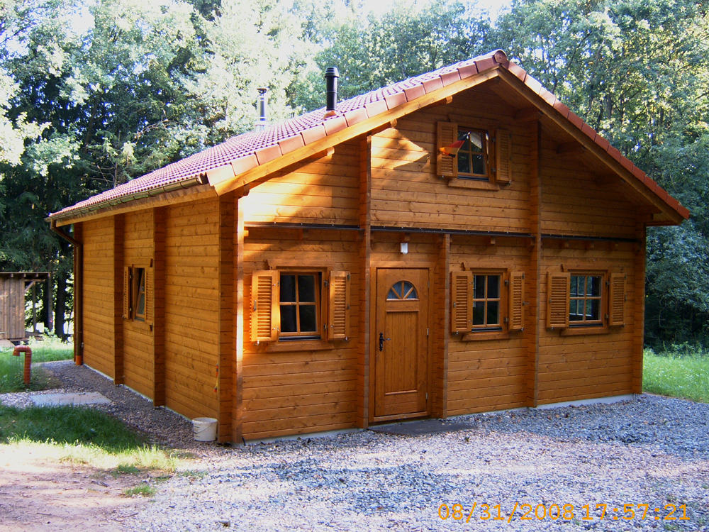 Blockhaus 60 qm mit Empore nach Kundenwunsch Karst Holzhaus